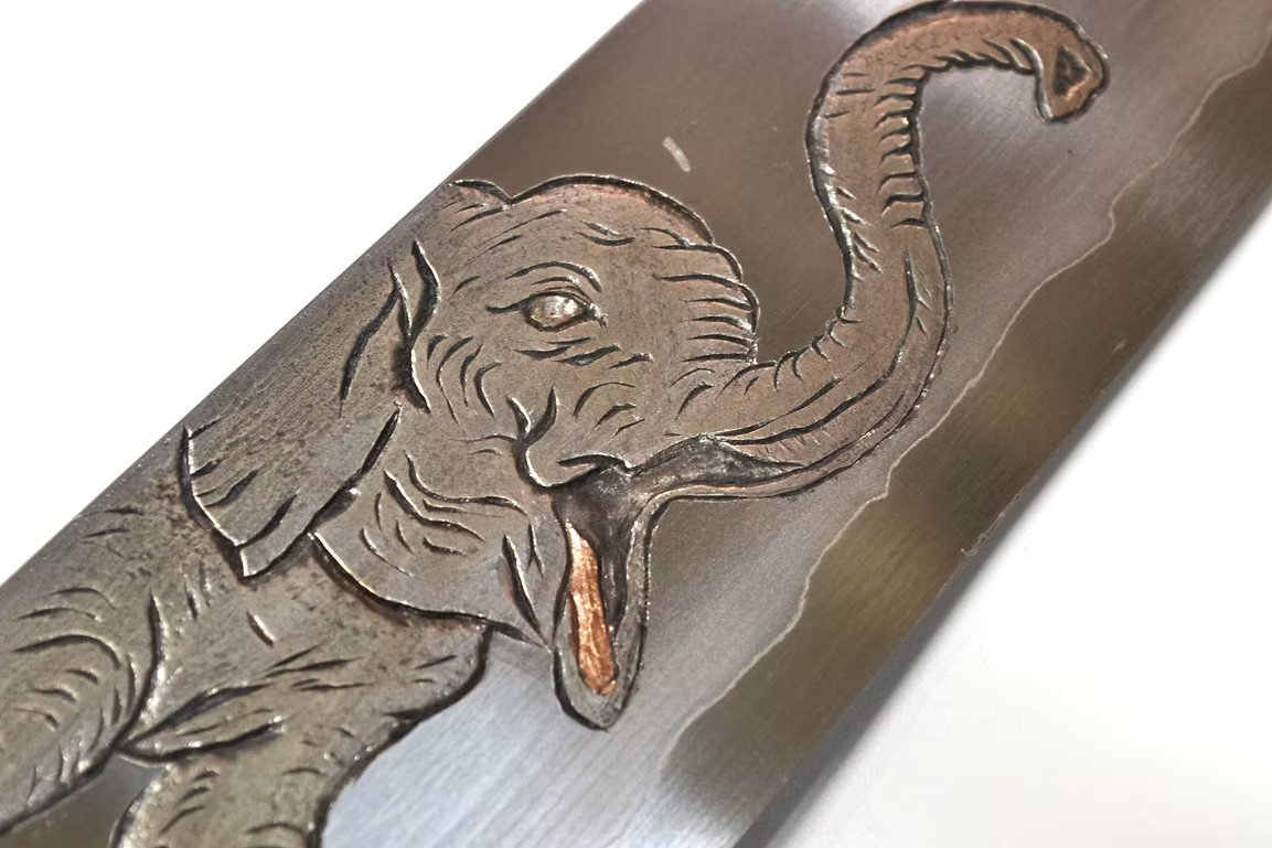 Sakai Takayuki Metal Decorated Engraving by Kubota Elephant Calf Silver Steel No.3 Gyuto 240mm Ebony Wood (ferrule: Black Water Buffalo Horn And Silver Ring) Handle