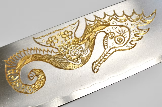 Sakai Takayuki Gold Filled Engraving by Kubota Seahorse Silver Steel No.3 Santoku 180mm Ebony Wood (ferrule: Black Water Buffalo Horn And Silver Ring) Handle