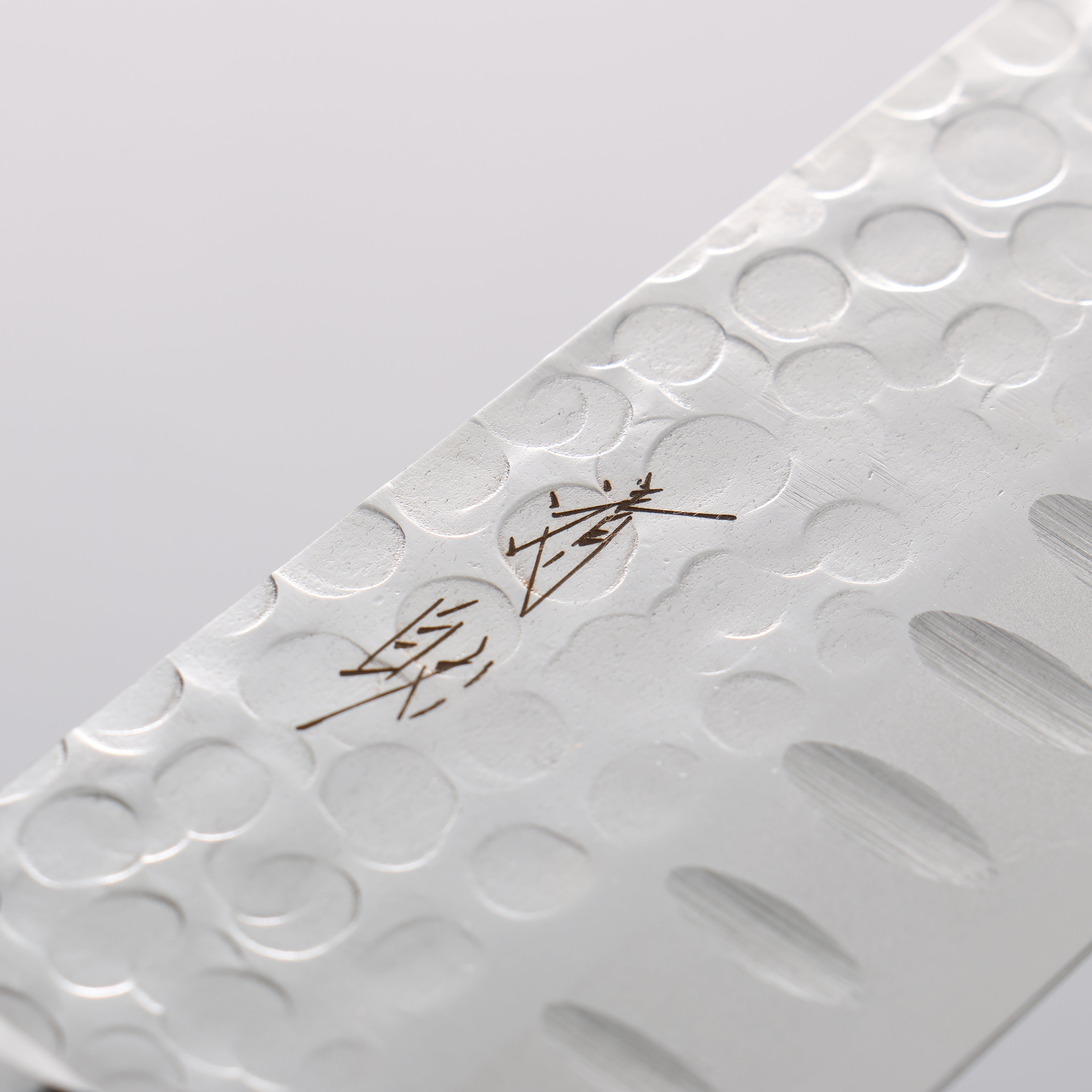 Seisuke Blue Steel Hammered Ribbed Santoku 180mm Black Pakka wood Handle - Japanny - Best Japanese Knife