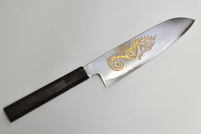 Sakai Takayuki Gold Filled Engraving by Kubota Seahorse Silver Steel No.3 Santoku 180mm Ebony Wood (ferrule: Black Water Buffalo Horn And Silver Ring) Handle