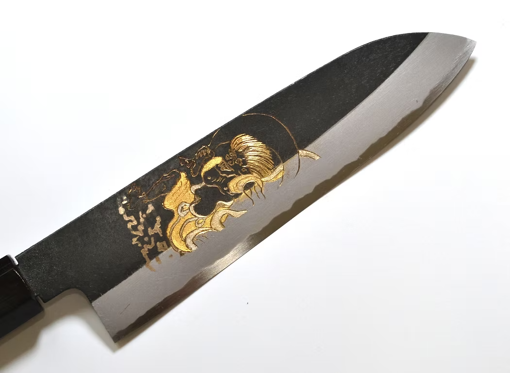 Sakai Takayuki Gold Filled Engraving by Kubota Fūjin White Steel No.2 Black Finished Santoku 180mm Ebony Wood (ferrule: Black Water Buffalo Horn And Silver Ring) Handle