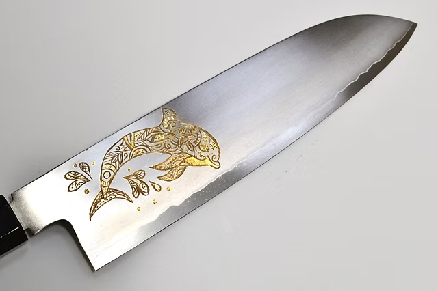 Sakai Takayuki Gold Filled Engraving by Kubota Dolphin Silver Steel No.3 Santoku 180mm Ebony Wood (ferrule: Black Water Buffalo Horn And Silver Ring) Handle
