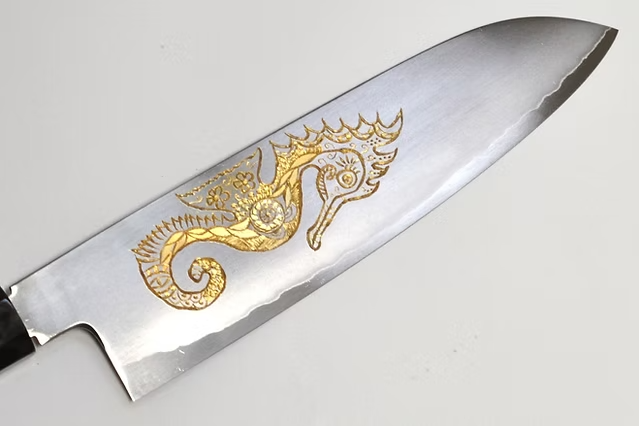 Sakai Takayuki Gold Filled Engraving by Kubota Seahorse Silver Steel No.3 Santoku 180mm Ebony Wood (ferrule: Black Water Buffalo Horn And Silver Ring) Handle