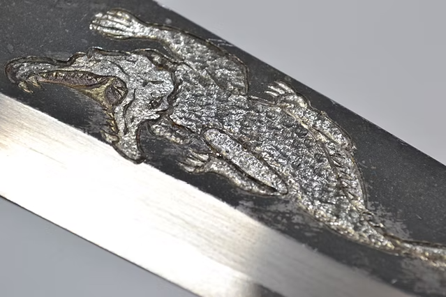 Sakai Takayuki Metal Decorated Engraving by Kubota Crocodile White Steel No.2 Black Finished Deba 165mm Ebony Wood (ferrule: Black Water Buffalo Horn And Silver Ring) Handle